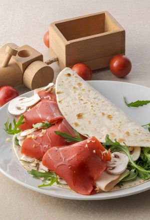 Piadina Fruttilette Fragola, tacchino, rucola e funghi