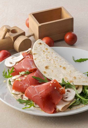 Piadina Fruttilette Fragola, tacchino, rucola e funghi